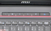 Vijf bijkomende functie-toetsen bevinden zich naast de aan/uit-knop (rechts).