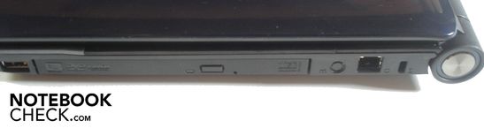 Rechts: USB 2.0, DVD brander, RJ-11 modem, Kensington Lock