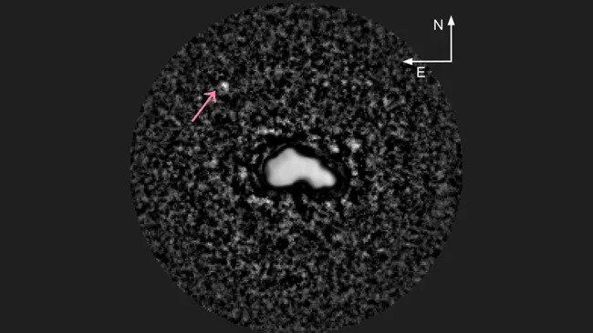 Een afbeelding van de asteroïde 44 Nysa en zijn maan.
