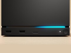 Vooraanzicht van de Valve Steam Machine met dubbele USB-poorten, een USB-C poort, een voedings-LED, een ronde aan/uit-knop en een blauwe LED-strip. (Afbeeldingsbron: Valve)