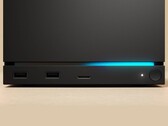 Vooraanzicht van de Valve Steam Machine met dubbele USB-poorten, een USB-C poort, een voedings-LED, een ronde aan/uit-knop en een blauwe LED-strip. (Afbeeldingsbron: Valve)