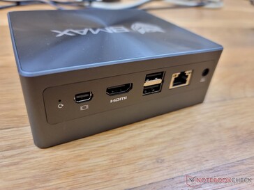 Achterkant: Resetknop, mini DisplayPort 1.4 (tot 4K 60 Hz), HDMI 1.4, 2x USB-A, Gigabit RJ-45, AC-adapter