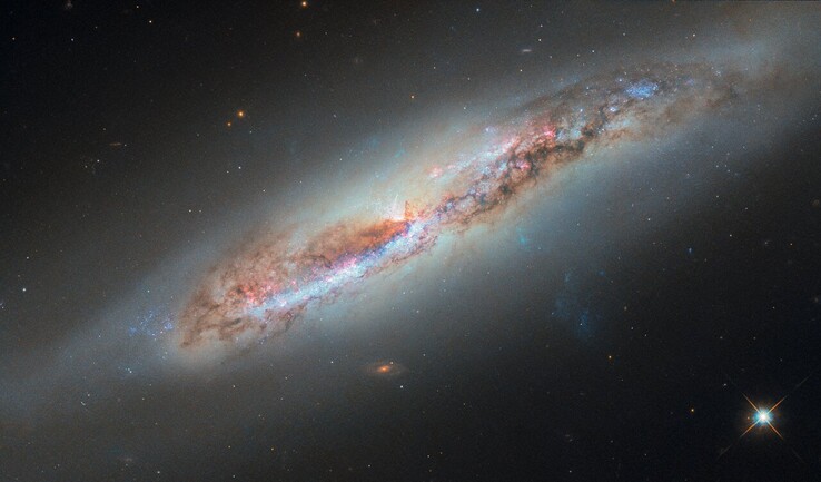 Hubblebeeld van NBC 4388 (Beeldbron: ESA/Hubble, NASA, S. Veilleux, J. Wang en J. Greene)