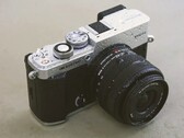 Het ontwerp van de OM Pen is geïnspireerd op de Olympus Pen uit 1959.