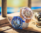 Twee Tendence One Piece-horloges in beperkte oplage, Log Pose en East Blue, weergegeven boven een zeekaart met de branding van de Batch N°2-samenwerking.