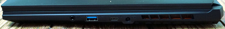 Rechts: headset, USB-A (5 Gbit/s), Thunderbolt 4, voeding