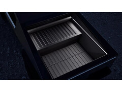 Een promotionele afbeelding voor het Cybertruck range extender batterijpakket van Tesla, getoond in het bed van een Cybertruck. (Afbeelding: Tesla)