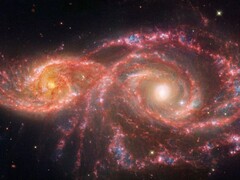 Een afbeelding gemaakt door de James Webb Space Telescope, waarop te zien is hoe de twee sterrenstelsels IC 2163 en NGC 2207 samensmelten. (Afbeeldingsbron: © NASA, ESA, CSA, STScI)