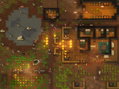 RimWorld-gameplayscreenshot van een kolonie die wordt aangevallen, met branden, dieren en gebouwen.