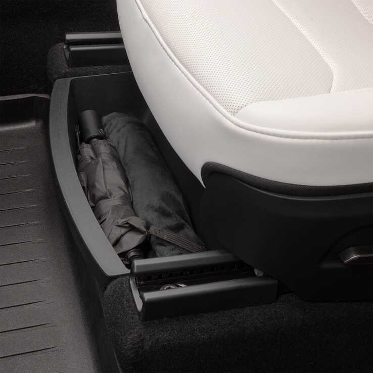 Opbergbak onder de stoel van de Model Y