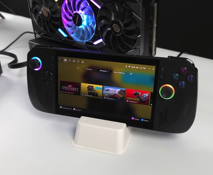 Asus ROG Ally X handheld aangesloten op een AMD Radeon RX 9070 XT in een extern Oculink eGPU dock, toont games als Spider-Man 2, Cyberpunk 2077, Forza Horizon 5 en Borderlands 4 op het scherm (bron: ETA PRIME via YouTube)