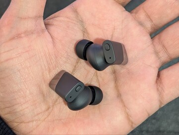 Fysieke knop bovenaan de oordopjes.