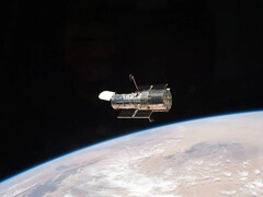 Een afbeelding van de Hubble ruimtetelescoop in een baan om de aarde (Afbeeldingsbron: NASA; bijgesneden)