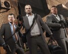 Grand Theft Auto V hoofdpersonages Michael, Trevor en Franklin tijdens een overvalmissie met wapens en tassen. (Afbeeldingsbron: Rockstar Games)