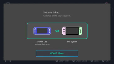 Stap 3 van het koppelen van Nintendo Switch consoles voor het delen van virtuele spelkaarten: Het bevestigingsscherm "Systemen gekoppeld" verschijnt om aan te geven dat het koppelingsproces is voltooid. De gebruiker wordt geïnstrueerd om verder te gaan op het bronsysteem door op de HOME Menuknop te drukken.