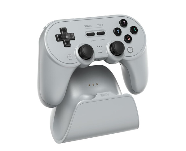 De 8BitDo Pro 3 wordt geleverd met een oplaaddock waarin de 2,4GHz-adapter zich bevindt. (Afbeeldingsbron: 8BitDo)