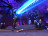 World of Warcraft-scène van een tovenaar die wordt weggeblazen door een vlammende blauwe straal (Beeldbron: Windowscentral.com)