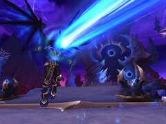 World of Warcraft-scène van een tovenaar die wordt weggeblazen door een vlammende blauwe straal (Beeldbron: Windowscentral.com)