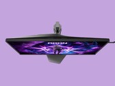 De afbeelding toont de AOC AG276UZ-gamingmonitor tegen een paarse achtergrond. De gamingmonitor heeft een uitgesproken gamingontwerp, compleet met RGB-verlichting aan de achterzijde.