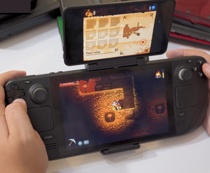 Steam Deck in combinatie met Retroid's scherm met twee schermen waarop SteamWorld Dig gameplay op het hoofdscherm en de in-game kaart op het secundaire scherm wordt getoond. (Afbeeldingsbron: GameXData via YouTube)