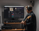 Een gitarist speelt voor een monitor waarop de app StemKit wordt weergegeven.