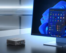 De NUC150 kan worden uitgerust met de Intel N150 of de Core 3 N355. Afgebeeld: een promo-afbeelding van de mini PC naast een monitor. (Afbeeldingsbron: Minix)