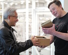 Jensen Huang overhandigt Elon Musk een van 's werelds eerste Nvidia DGX Spark compacte desktopcomputers, ontworpen voor de ontwikkeling van AI-modellen. (Afbeeldingsbron: Nvidia)