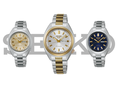 Van links naar rechts: Seiko SRE023K1, SRE024K1, en SRE021K1 (foto) tegen een witte achtergrond, met het logo van Seiko ertussen. (Afbeeldingsbron: Seiko)