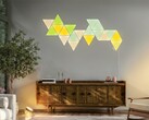 De Philips Hue-wandlampmodule kan worden aangesloten op compatibele Nanoleaf-panelen, zoals afgebeeld.