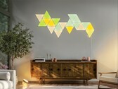 De Philips Hue-wandlampmodule kan worden aangesloten op compatibele Nanoleaf-panelen, zoals afgebeeld.