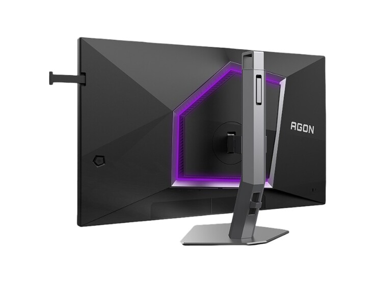 De afbeelding toont de achterzijde van de AOC Agon Pro AG276UZ-gamingmonitor, die een uitgesproken gaming-ontwerp heeft met paarse RGB-verlichting.