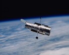 Een afbeelding van de Hubble in een baan om de aarde (Afbeeldingsbron: NASA; bijgesneden)