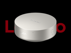 De Lenovo Yoga Mini i minipc, afgebeeld tegen een zwarte achtergrond met het Lenovo-logo erop. (Afbeelding bron: Lenovo - bewerkt)