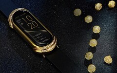 De Xiaomi Mi Band wearable wordt getrakteerd op een gouden en diamanten make-over in de &quot;Gold Collection&quot;. (Afbeelding bron: Xiaomi - bewerkt)