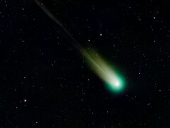 Een afbeelding van een komeet met een groene staart.