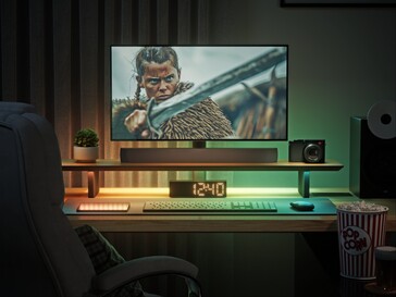 Slimme LED-monitorstandaard met sfeerverlichting voor het bekijken van films.