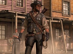 John Marston in een stadsscène uit Red Dead Redemption (Afbeelding bron: Rockstar Games)