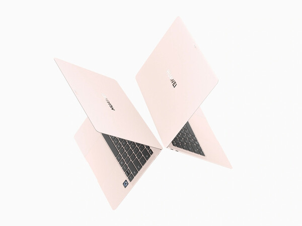 De Huawei MateBook Pro in Dawn Pink heeft zwarte toetsen maar een roze trackpad. (Afbeeldingsbron: Huawei)