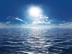 Een afbeelding van de oceaan onder een blauwe hemel. (Afbeeldingsbron: Mathias Weil, Adobe Stock)