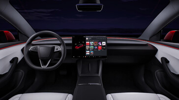 Tesla zegt dat het de materialen in de Model 3 heeft geüpgraded, en het heeft dubbele draadloze opladers onder het infotainmentscherm geplaatst. (Afbeeldingsbron: Tesla)