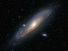 Een afbeelding van de Andromeda Galaxy en zijn satellietstelsels.