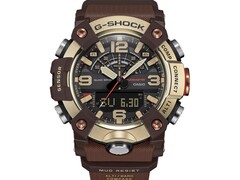 Close-up van de G-Shock Mudmaster GG-B100XMH-5A, waarbij de lichtgeelgouden en bruine kast en lunette goed tot hun recht komen.