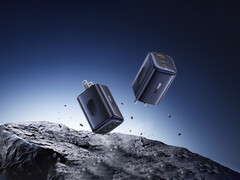 De nieuwe PicoGo 67 W AE11 kost $39,99. Afgebeeld: Een promofoto van de snellader die in de lucht boven rotsen zweeft. (Afbeeldingsbron: Baseus)