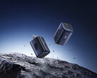 De nieuwe PicoGo 67 W AE11 kost $39,99. Afgebeeld: Een promofoto van de snellader die in de lucht boven rotsen zweeft. (Afbeeldingsbron: Baseus)