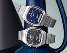De retro analoog-digitale horloges Casio AQ-240E-1A en AQ-240E-2A2, met respectievelijk een zwarte en een blauwe wijzerplaat met sunburst-patroon, worden naast elkaar getoond.