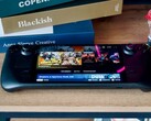 Een Steam Deck apparaat op een tafel (Afbeelding bron: Georgiy Lyamin via Unsplash)