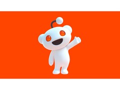Een promotionele afbeelding voor de mascotte van Reddit, Snoo, die naar de kijker zwaait en poseert tegen een rode achtergrond. (Afbeelding Bron: Reddit)