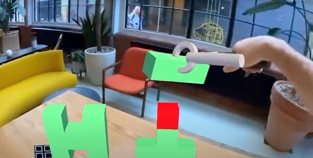 Met de Zapbox bluetooth-controllers kunt u creëren en manipuleren in 3D mixed-reality. (Bron: Zappar op YouTube)