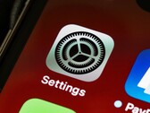 Close-up van het pictogram van de app ‘Instellingen’ op een iPhone-scherm