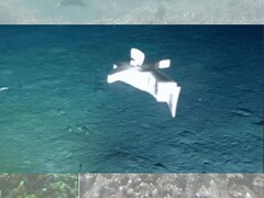 Een afbeelding van de robot op de bodem van de oceaan (Beeldbron: het onderzoeksteam; bewerkt)